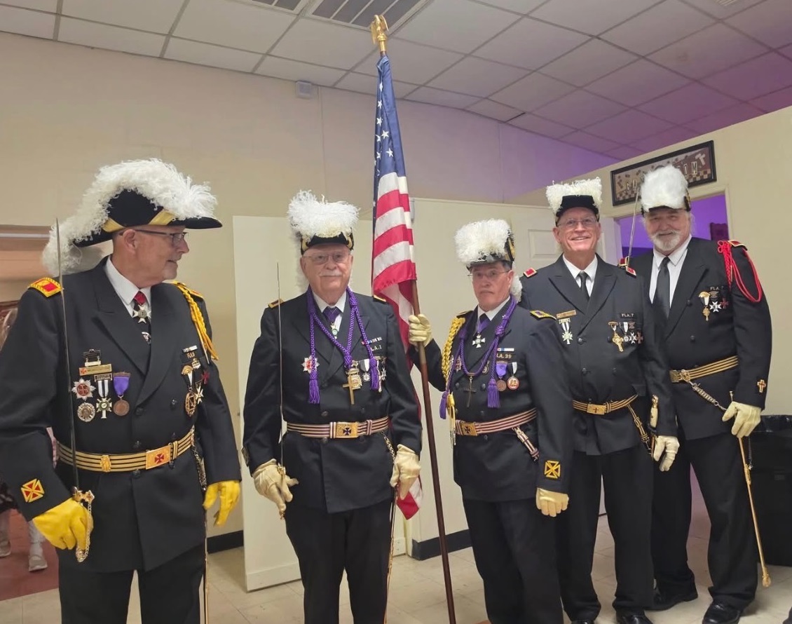 Members of the Grand Commandery of Knights Templar of Florida presenting the American flag at the Grand Master's Official Visit to District No. 7 in Lake City, Florida
